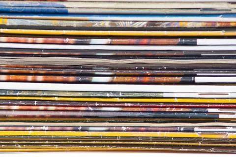 Stack of colorful magazines or documents - paper edges background Stock Photos