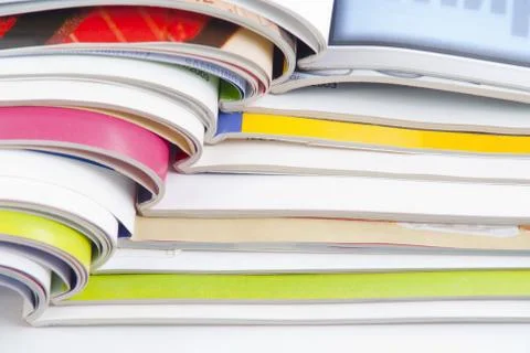Stack of colorful magazines or documents - paper edges background Stock Photos