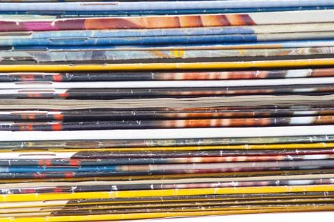 Stack of colorful magazines or documents - paper edges background Stock Photos