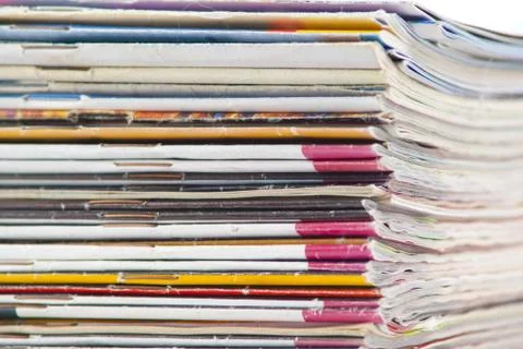 Stack of colorful magazines or documents - paper edges background Stock Photos