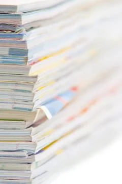 Stack of colorful magazines or documents - paper edges background Stock Photos