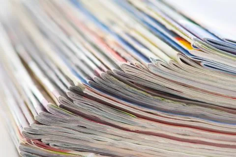 Stack of colorful magazines or documents - paper edges background Stock Photos