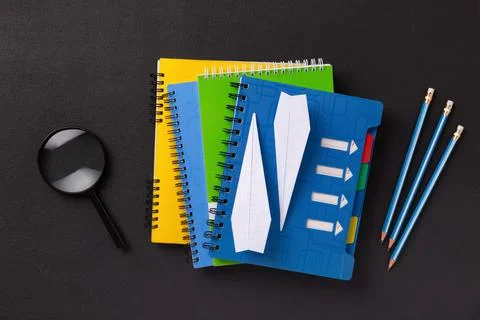 Stack of colorful notebooks of a student or school pupil Stock Photos