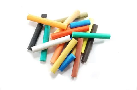Stack of colorful pastel chalks on white background for your art design Stock Photos
