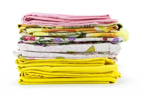 A stack of colorful pillowcases over a white background Stock Photos