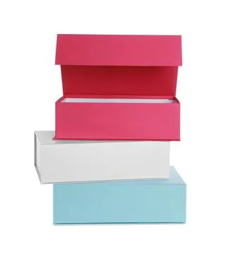 Stack of colorful shoe boxes on white background Foto stock