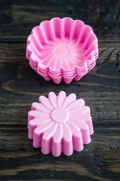 Stack of Colorful Silicon Cake Molds Foto stock