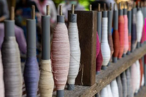 Stack of colorful silk rolls Fotos Stock