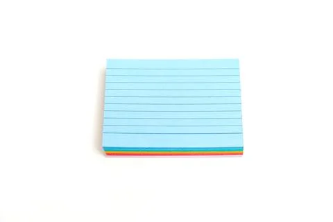 A stack of colorful sticky notes with a blue one in the middle Stock Photos