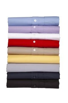 Stack of colorful t-shirts. Stock Photos