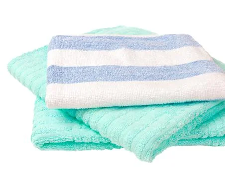 Stack of colorful towels on white background Stock Photos