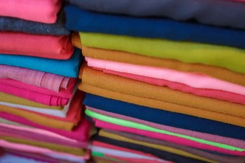 Stack of Colorful Turkish Fabrics in Textile Market Closeup Multicolored Tr.. Stock Photos