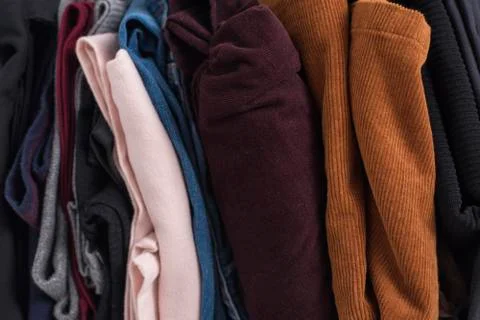 Stack of colorful warm clothes. Abstract background 스톡 사진
