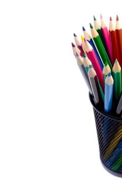 Stack of colour pencils inside the container on white background Foto stock