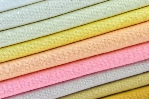Stack of colourful cotton clothes, close up pile of clothing 스톡 사진