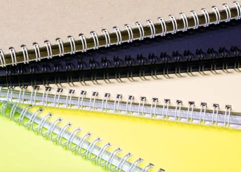 Stack of colourful notebooks with spiral edge Stock Photos