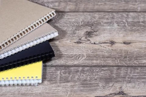 Stack of colourful notebooks with spiral edge Stock Photos