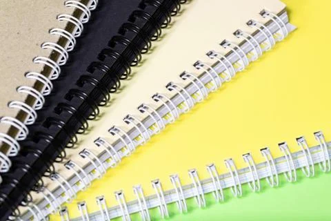 Stack of colourful notebooks with spiral edge Foto stock