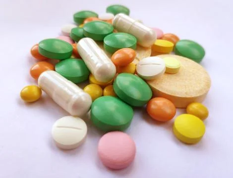 Stack of colourful pills, medicine background Stock Photos
