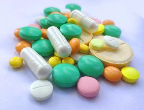 Stack of colourful pills, medicine background Stock Photos