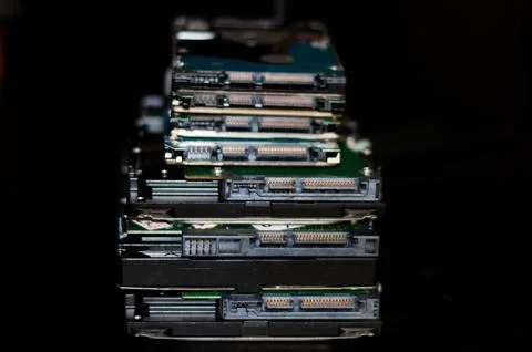 Stack of computer Hard disk drives and laptop Hard disk drives Foto stock