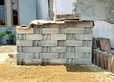 Stack of concrete blocks building materials on construction site. Stock Photos