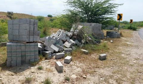 Stack Of Concrete Blocks For Roadside Infrastructure Construction Projects Stock Photos