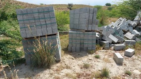 Stack Of Concrete Blocks For Roadside Infrastructure Construction Projects Stock Photos