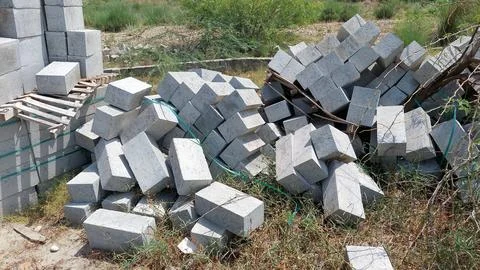 Stack Of Concrete Blocks For Roadside Infrastructure Construction Projects Foto stock