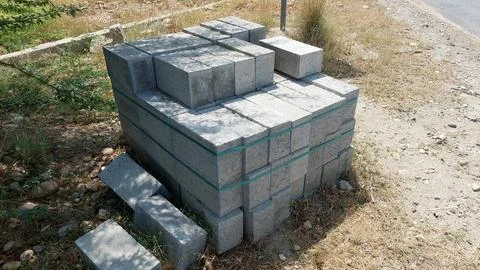 Stack Of Concrete Blocks For Roadside Infrastructure Construction Projects Foto stock