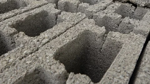 Stack of concrete bricks blocks on the palette at warehouse close up Stock Footage 243836160