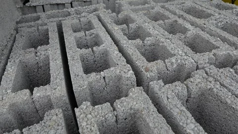 Stack of concrete bricks blocks on the palette at warehouse close up Stock Footage 243836173