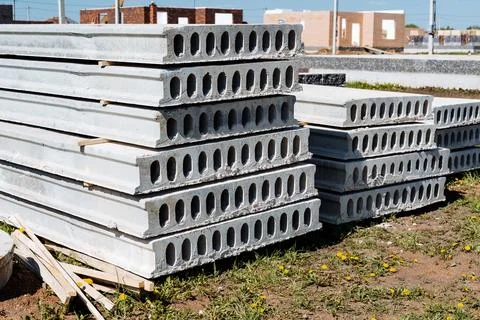 A stack of concrete slabs arranged atop each other at a construction site, .. Stock Photos
