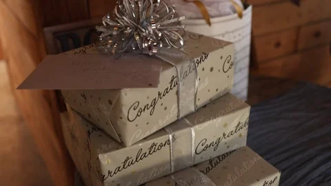 Stack of congratulations gift boxes with ribbons Stock Footage 338034730
