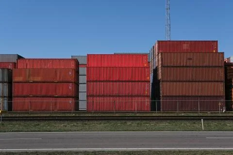 Stack of containers in harbor. industrial background Stock Photos