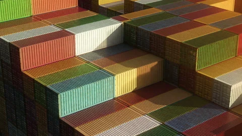 Stack of containers in a harbor, shipping at dockyard, logistic import and Stock Footage 109054652