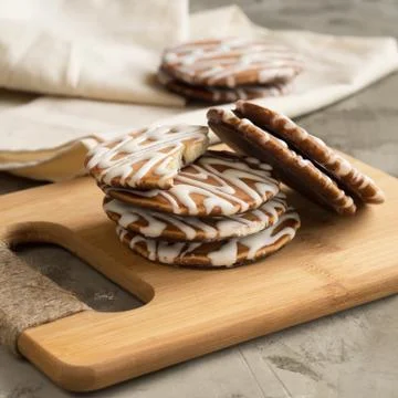 Stack of cookies on a bamboo board. Stock Photos
