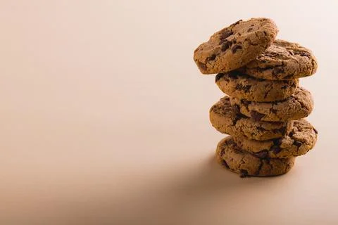 Stack of cookies on beige background with copy space Foto stock