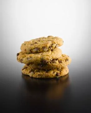 Stack of cookies on coloured background, close up Stock Photos