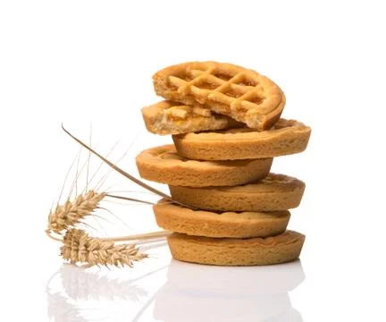 Stack of cookies with jam and spikelets isolated on white background Stock Photos