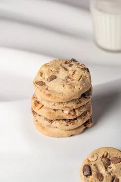 A stack of cookies with one in the corner 스톡 사진