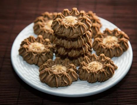 Stack of cookies in a plate on a table close up Stock Photos