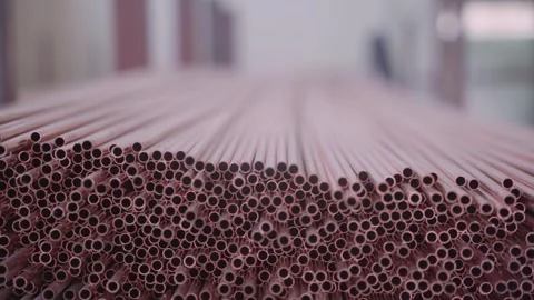 Stack of Copper Tubes for Heat Exchangers - Industrial Factory Production Stock Footage 330493434