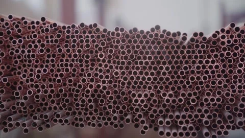 Stack of Copper Tubes for Heat Exchangers - Industrial Factory Production Video stock 330493545