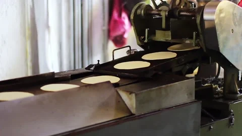 Stack of Corn Tortilla fresh of the Machine Video stock 134372201