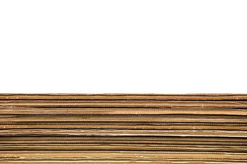 Stack of corrugated cardboard boxes on white background with copy space Stock Photos