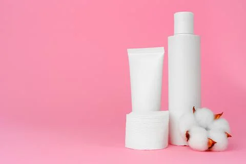 Stack of cotton discs and skicare cosmetic bottle Stock Photos