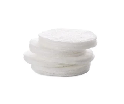 Stack of cotton pads on white background Foto stock