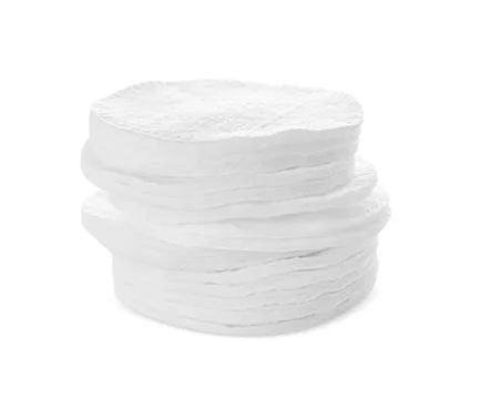 Stack of cotton pads on white background Foto stock