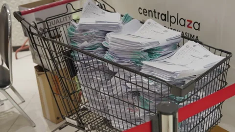 Stack Of Covid Flu Vaccine Paper Medical Records In Shopping Cart At Clinic Stock-Footage 256050939